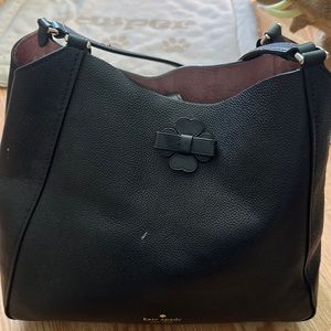 Black Kate Spade purse.